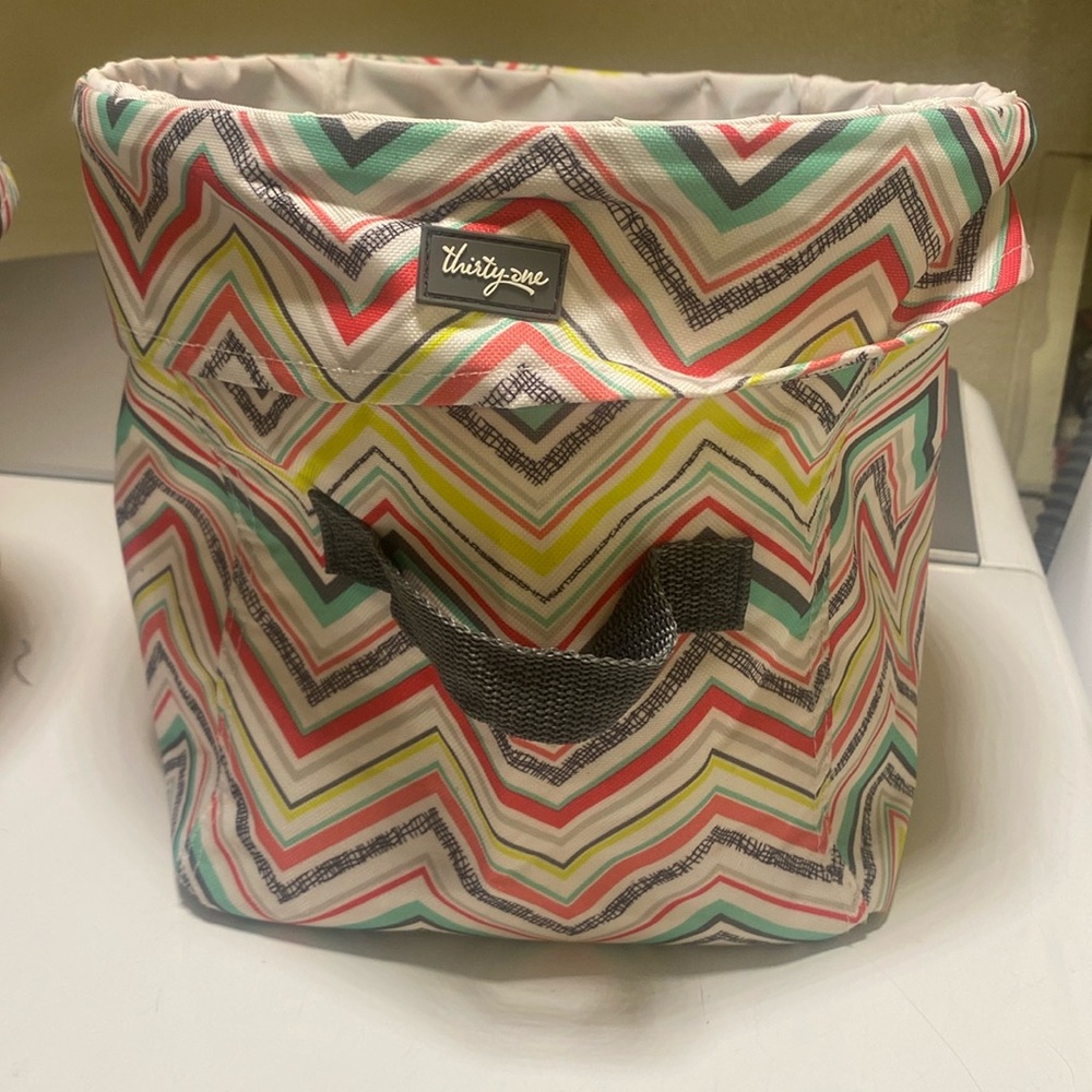 Thirty one small utility bin